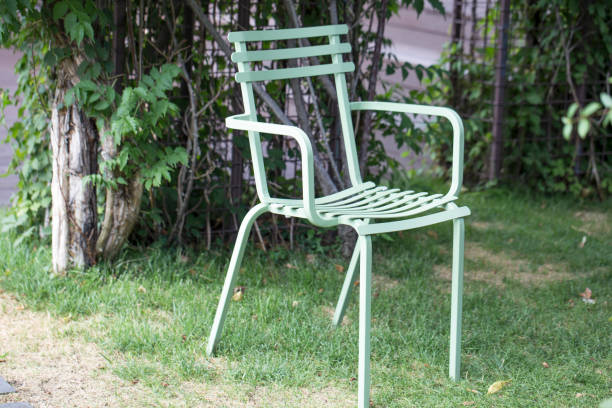 istock Chairs in the green garden 1172464668