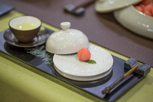 istock a cup of green tea and desert 1172464827