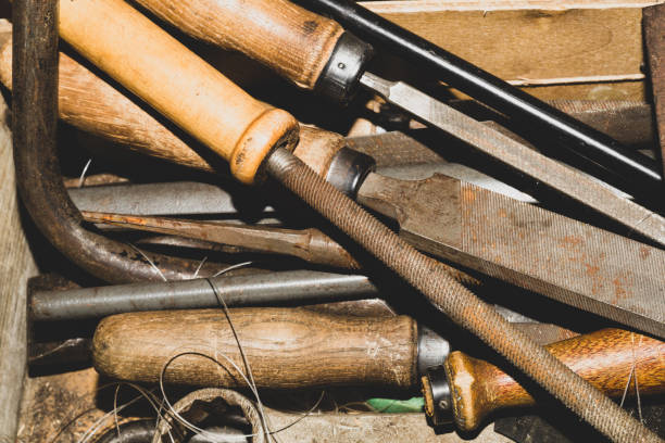 istock Pile of the old rasps. different carpentry files. various graters. instrument for wood processing 1172473347
