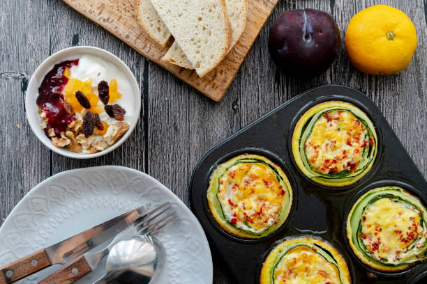 homemade healthy breakfast: cucumber muffin stuffed with egg and shrimp homemade healthy breakfast: cucumber muffin stuffed with egg and shrimp muffin tin eggs stock pictures, royalty-free photos & images