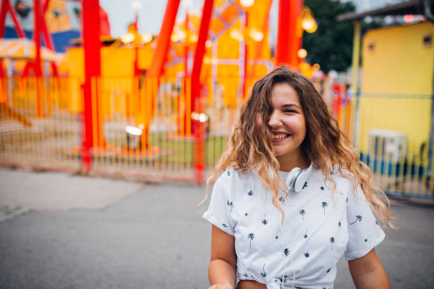 istock Girlfriends have fun at the amusement park 1172476129