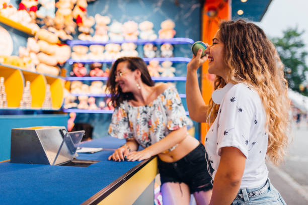 istock Girlfriends have fun at the amusement park 1172476198