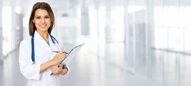 istock Female doctor looking at camera and smiling 1172478289