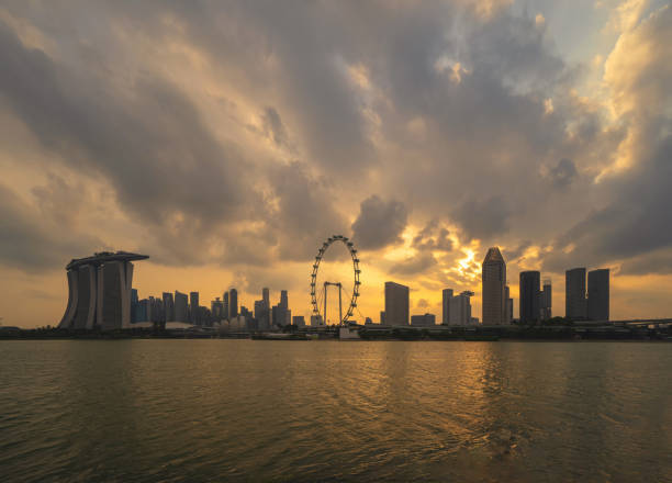 istock Singapore Downtown skyline at sunset with reflection. Financial district and business centers in technology smart urban city in Asia. Skyscraper and high-rise buildings. 1172485122