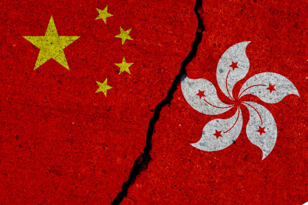 istock china and hong kong flags painted over cracked concrete wall 1172485692
