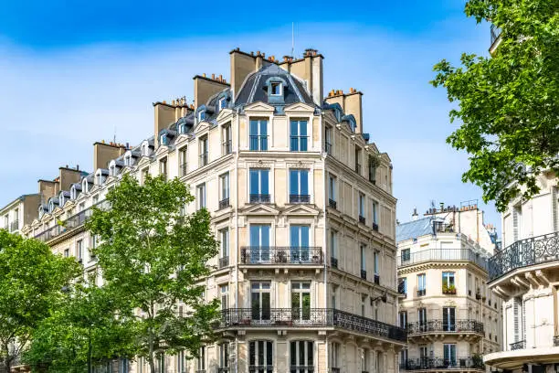 Paris, typical building, parisian facade wall and windows boulevard de Sebastopol