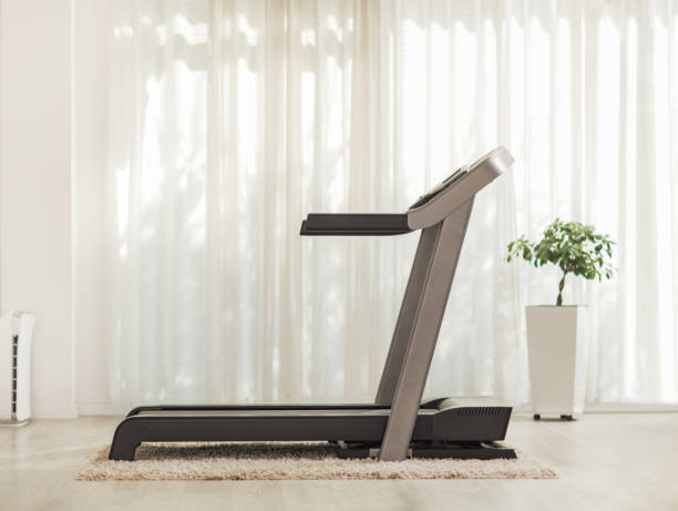 Professional modern treadmill at home Shot of a professional modern treadmill at home treadmill stock pictures, royalty-free photos & images