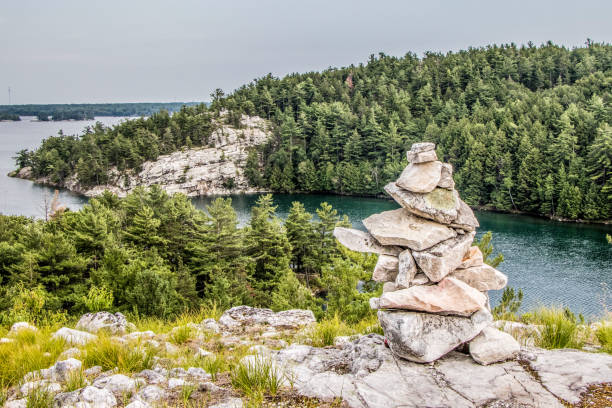 istock Inukshuk at Covered Portage, Killarney, Ontario 1172488850