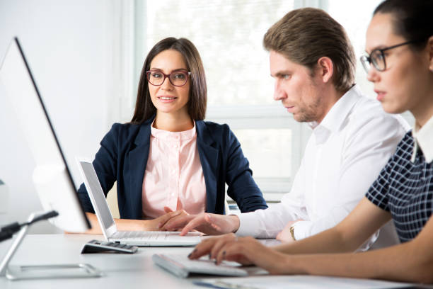 istock Group of business people working together in a office 1172494730