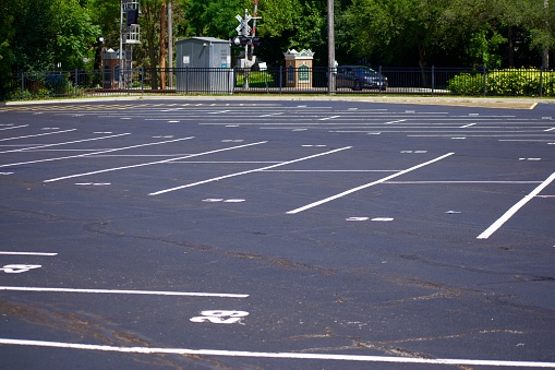New train station parking lot with fresh sprayed numbers