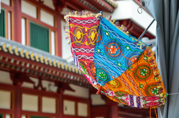 istock Singapore - FEB 28, 2019: Umbrella hanging on the shed. 1172510360