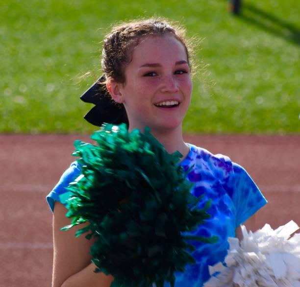 istock Blue tie dye theme cheerleader for football game 1172510475