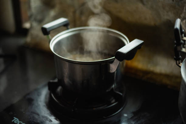 istock steam over cooking pot in kitchen 1172515088