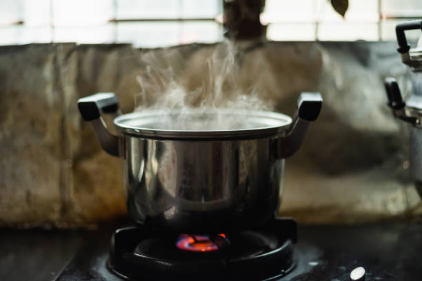 istock steam over cooking pot in kitchen 1172515105