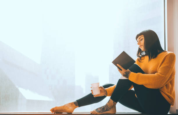 istock Young women relaxing at home 1172516844