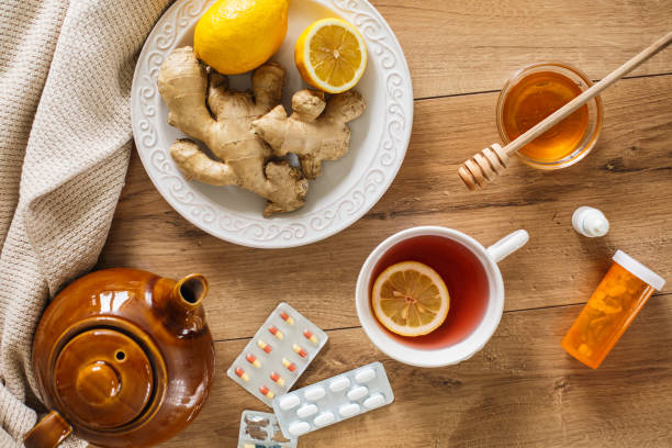 naturalne środki na grypę - ginger tea cup cold and flu tea zdjęcia i obrazy z banku zdjęć