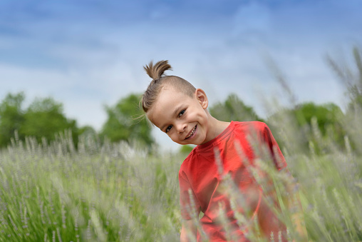 smiling child in the field