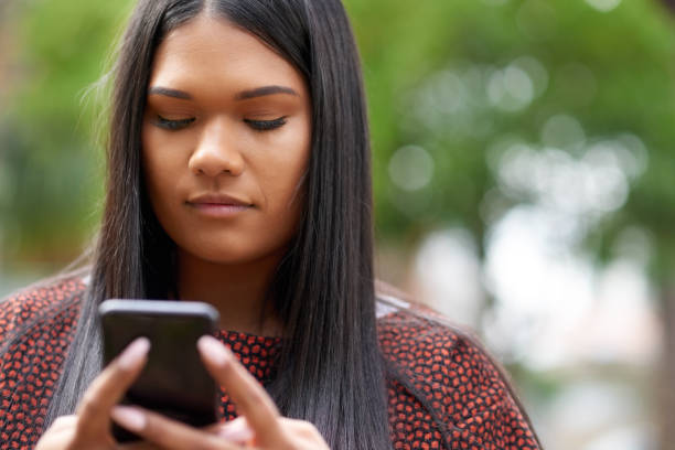 istock She's got messages to respond to 1172525885
