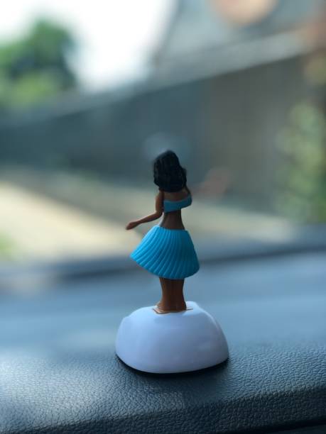 istock Hula girl on car dashboard 1172526657