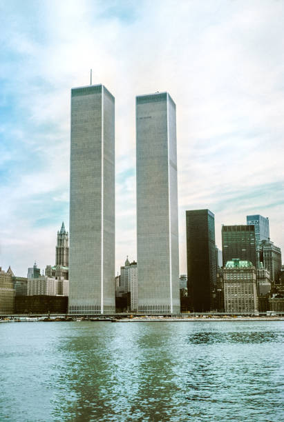 Twin Towers New York Archival and historical Twin Towers of World Trade Center in foreground from Hudson River. Skyline of Manhattan, New York Cityscape, United States. Vertical shot. twin towers manhattan stock pictures, royalty-free photos & images