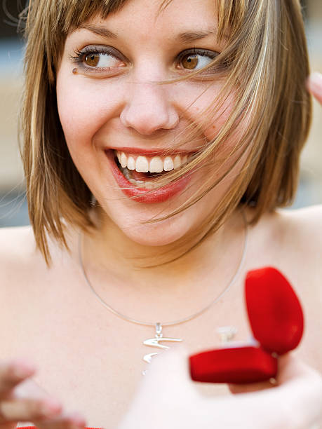 istock Surprised woman and engagement ring 117253022