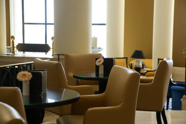istock Cozy and elegant foyer area with retro-style armchairs 1172530569