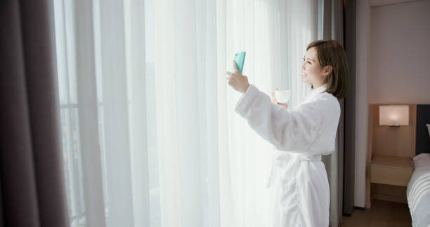 istock woman take selfie by smartphone 1172534680