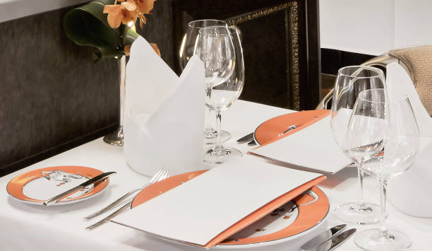 istock Restaurant Table Set Up With Wine Glass And Cutlery 1172539862