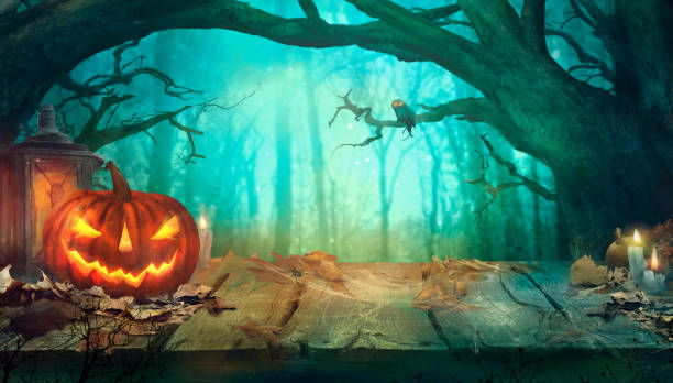 istock Halloween with Pumpkins and Dark Forest 1172540113