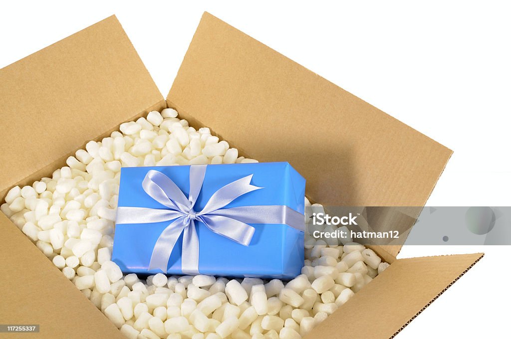 Scatola di cartone con regalo blu - Foto stock royalty-free di Angolo - Descrizione