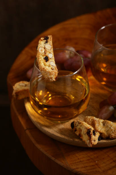 istock dessert white wine and biscotti 1172554135