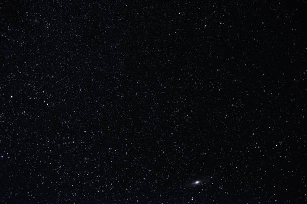istock Starry sky summer night with the Andromeda nebula 1172555828
