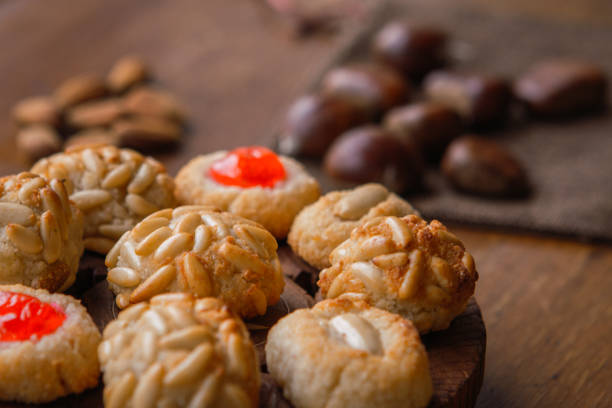 istock Some panellets with roasted chesnuts on the background on a wooden table. Typical snack eaten in All Saints Day in Catalonia, Spain 1172556783