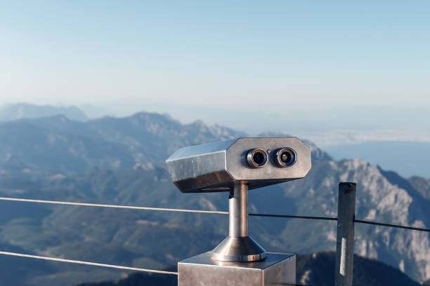 istock Stationary binoculars or binoscope on the viewing platform against the background beautiful landscape in the mountains. Lovely view of the Taurus Mountains and the Mediterranean coast. Kemer, Turkey 1172558350