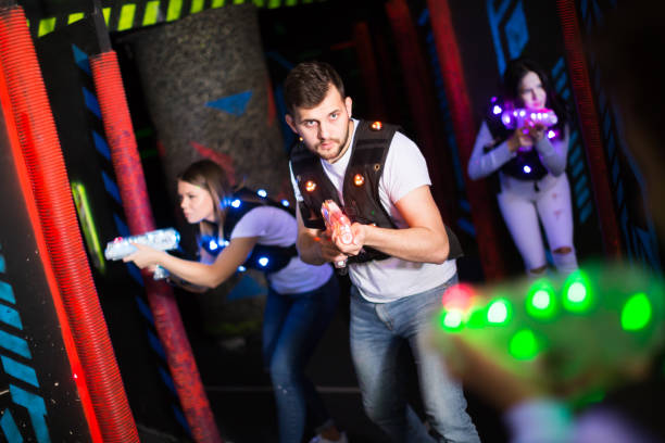 istock Young man on laser tag arena 1172560617