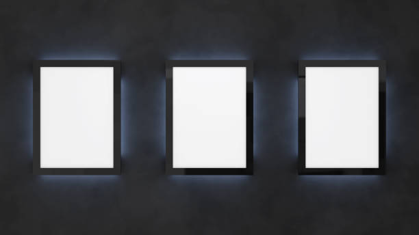 Poster mockup on the black wall with backlight. Cinema lightbox template.