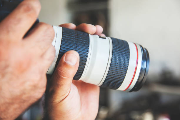 istock the photographer man hand photo camera 1172563596