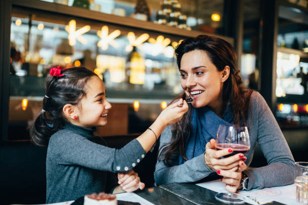 istock Family eating in restaurant 1172563749