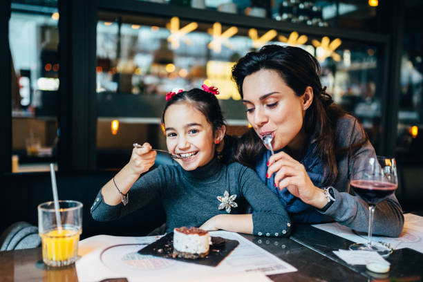 istock Family eating in restaurant 1172563959