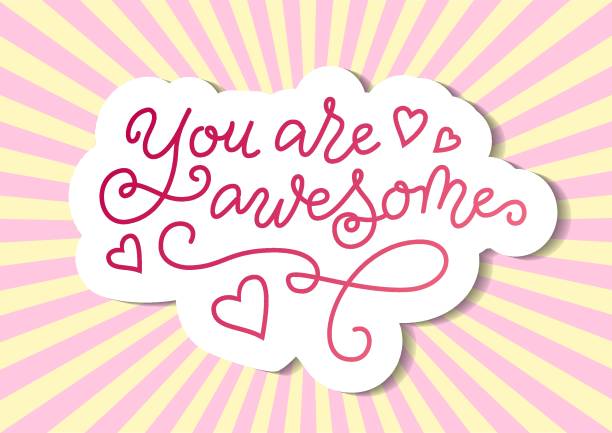 istock lettering of You are awesome in pink with white outline on backdrop with pink rays 1172566457