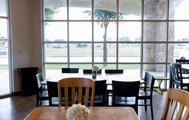 Rearview shot of a couple sitting together in a coffee shop