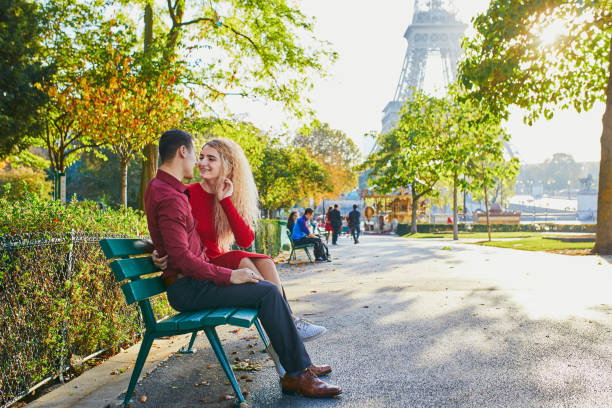 istock Romantic couple in love near the Eiffel tower 1172568197