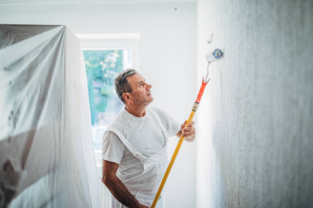 istock Senior man painting 1172568469