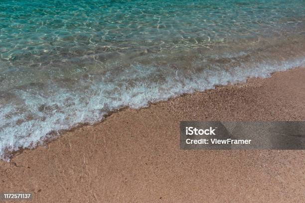 Sea Wave On The Sandy Beach Stock Photo - Download Image Now - Advertisement, Backgrounds, Beach