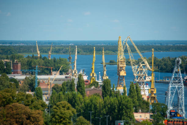 istock Cityscape with yellow cranes in the background 1172571268