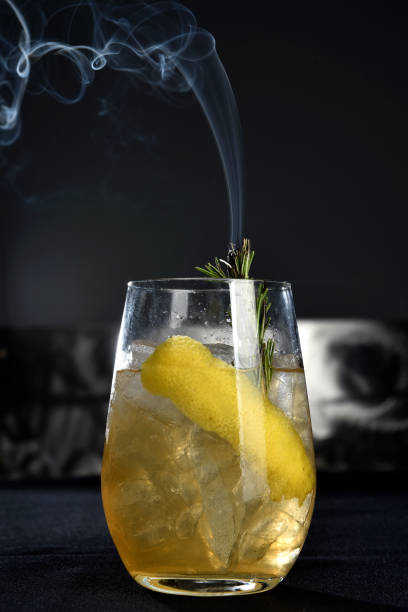 istock ALCOHOLIC DRINK WITH FRUIT COCKTEL on black background, 1172571397