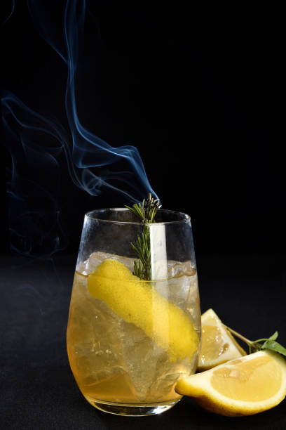 istock ALCOHOLIC DRINK WITH FRUIT COCKTEL on black background, 1172571411