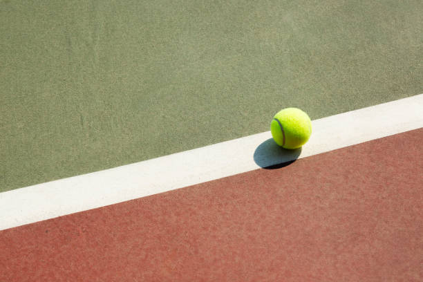 istock Group of tennis ball on hard court 1172572607