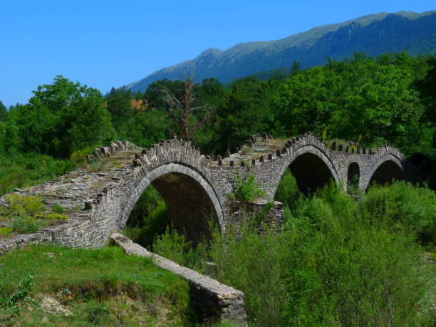 istock Three-arched Kaloutas Bridge, Zagoritikos River, Epirus, Greece 1172572656