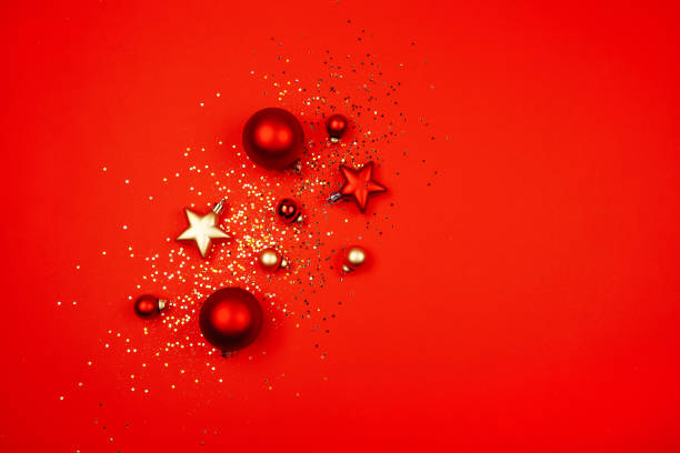 istock Christmas decorations on a red background. Sequins, snowflakes, New Year concept. 1172574390